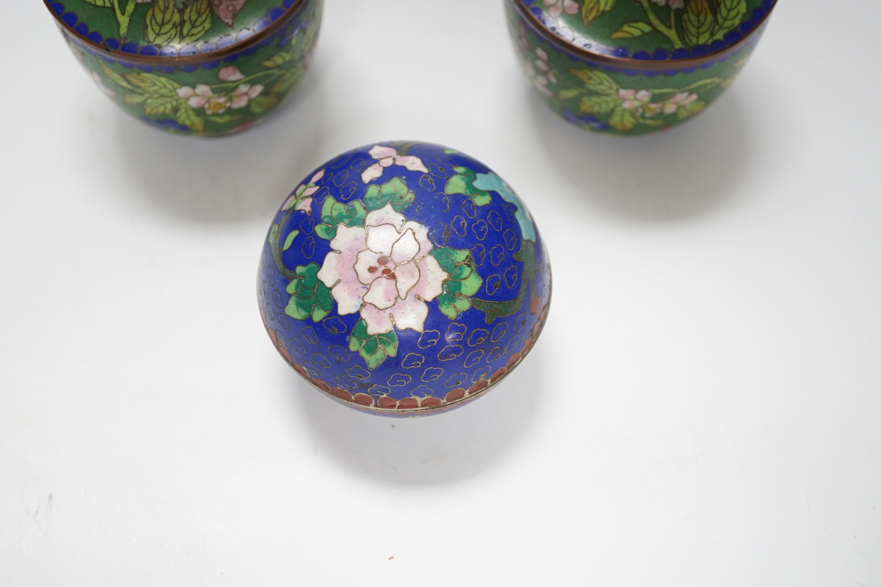 A pair of Chinese cloisonné enamel vases and a box and cover, vases 14cm high
